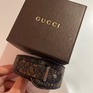 Vintage Gucci brown leather cuff bracelet with orange accents